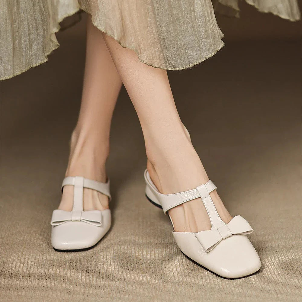 Mules Verona de cuero con tira en T