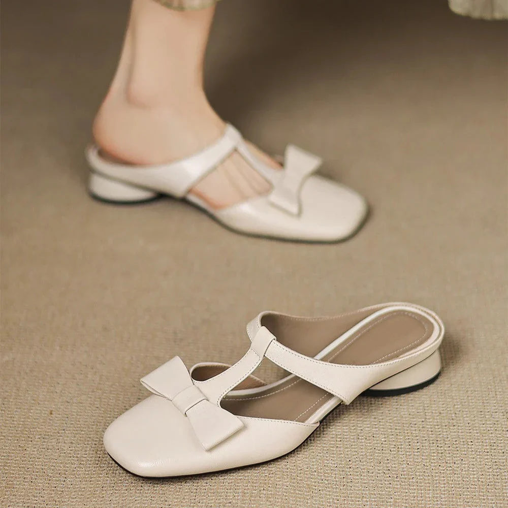 Mules Verona de cuero con tira en T