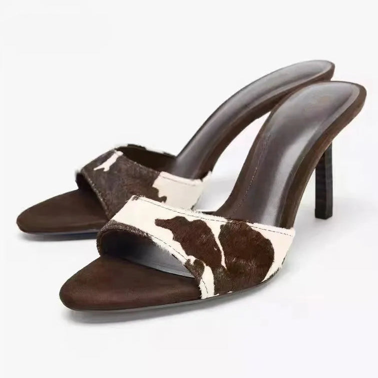 Tacones mule de piel de vaca Rhea