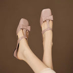 Mules Verona de cuero con tira en T