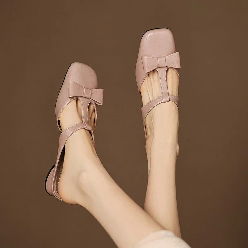Mules Verona de cuero con tira en T