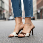 Tacones mule de piel de vaca Rhea